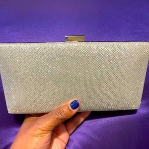 Women’s clutch purse with chain strap